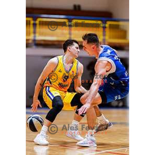 Nejc Baric and Jure Span in action during OTP Bank League 2025/2026 basketball match between Hopsi Polzela and Sentjur in Polzela, Slovenia on October 4, 2025 