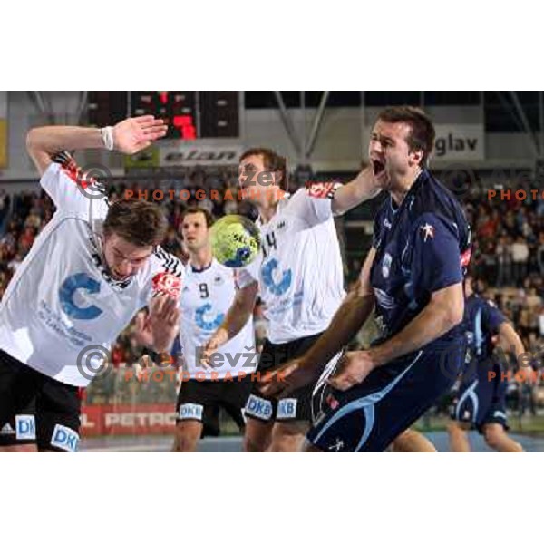 Klemen Cehte (blue shirt) at handball match Slovenia- Germany in Qualification for Euro 2010, played in Arena Zlatorog, Celje, Slovenia 2.11.2008. Germany won 27:26 
