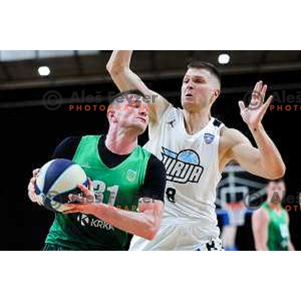 Jan Rebec of Krka and Edo Muric of Ilirija in action during OTP Bank League 2025/2026 basketball match between Ilirija and Krka in Hala Tivoli, Ljubljana, Slovenia on October 9, 2025. Photo: Filip Barbalic