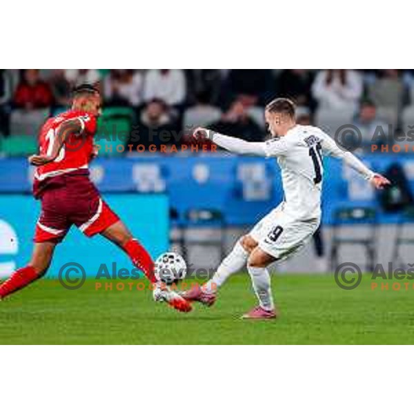 Djibril Sow and Tomi Horvat in action during FIFA World Cup 2026 European Qualifiers match between Slovenia and Switzerland in SRC Stozice, Ljubljana, Slovenia on October 13, 2025