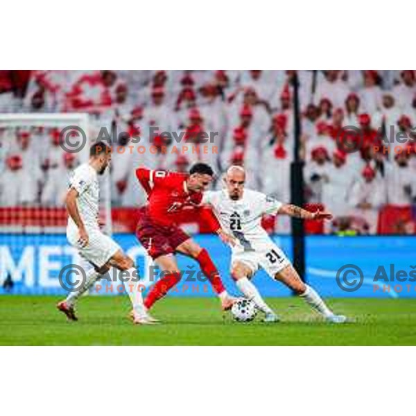 Danijel Sturm, Ruben Vargas and Vanja Drkusic in action during FIFA World Cup 2026 European Qualifiers match between Slovenia and Switzerland in SRC Stozice, Ljubljana, Slovenia on October 13, 2025