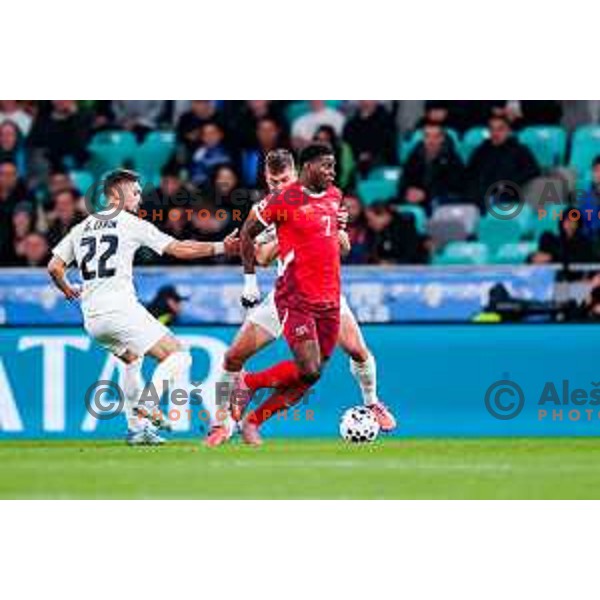 Jaka bijol and Breel Embolo in action during FIFA World Cup 2026 European Qualifiers match between Slovenia and Switzerland in SRC Stozice, Ljubljana, Slovenia on October 13, 2025