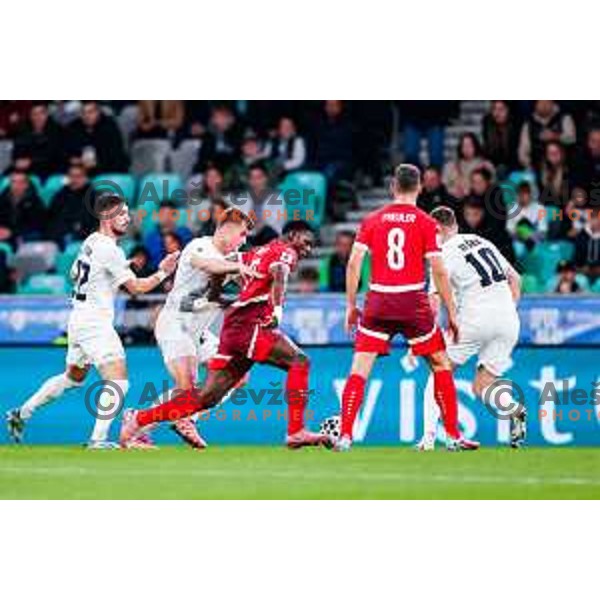 Jaka bijol and Breel Embolo in action during FIFA World Cup 2026 European Qualifiers match between Slovenia and Switzerland in SRC Stozice, Ljubljana, Slovenia on October 13, 2025