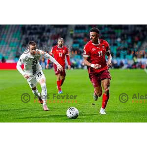 Tomi Horvat and Dan Ndoye in action during FIFA World Cup 2026 European Qualifiers match between Slovenia and Switzerland in SRC Stozice, Ljubljana, Slovenia on October 13, 2025