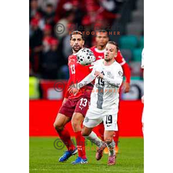 Ricardo Rodriguez and Tomi Horvat during FIFA World Cup 2026 European Qualifiers match between Slovenia and Switzerland in SRC Stozice, Ljubljana, Slovenia on October 13, 2025