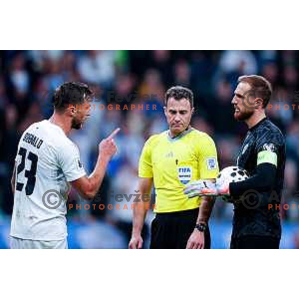 David Brekalo, referee Felix Zwayer and Jan Oblak during FIFA World Cup 2026 European Qualifiers match between Slovenia and Switzerland in SRC Stozice, Ljubljana, Slovenia on October 13, 2025