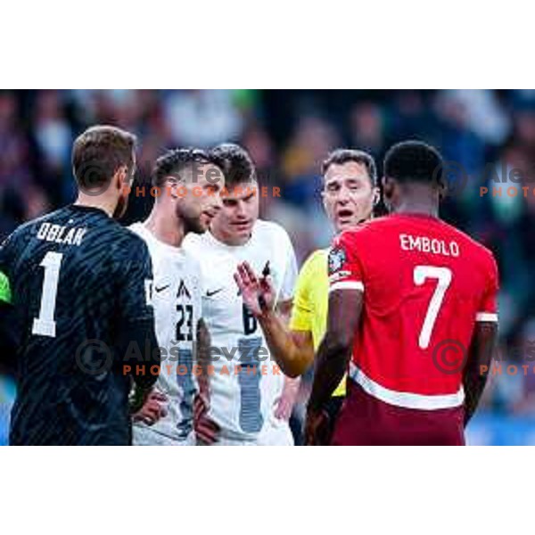David Brekalo, referee Felix Zwayer and Breel Embolo during FIFA World Cup 2026 European Qualifiers match between Slovenia and Switzerland in SRC Stozice, Ljubljana, Slovenia on October 13, 2025