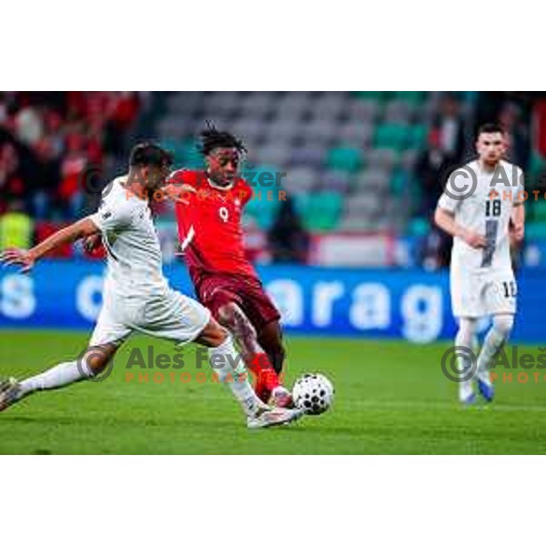 David Brekalo and Breel Embolo in action during FIFA World Cup 2026 European Qualifiers match between Slovenia and Switzerland in SRC Stozice, Ljubljana, Slovenia on October 13, 2025