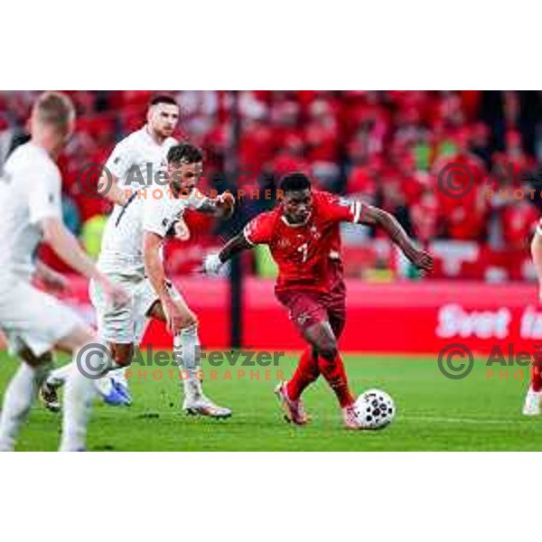 David Brekalo and Breel Embolo in action during FIFA World Cup 2026 European Qualifiers match between Slovenia and Switzerland in SRC Stozice, Ljubljana, Slovenia on October 13, 2025