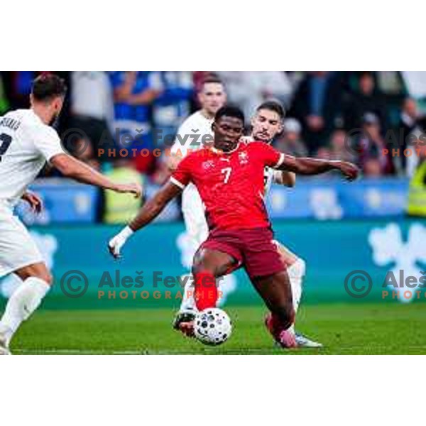 Adam Gnezda Cerin and Breel Embolo in action during FIFA World Cup 2026 European Qualifiers match between Slovenia and Switzerland in SRC Stozice, Ljubljana, Slovenia on October 13, 2025