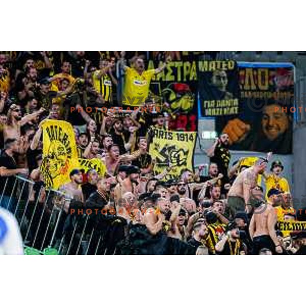 Fans of Aris cheering during BKT EuroCup 2025-2026 basketball match between Cedevita Olimpija (SLO) and Aris Thessaloniki Betsson (GRE) in SRC Stozice, Ljubljana, Slovenia on October 14, 2025