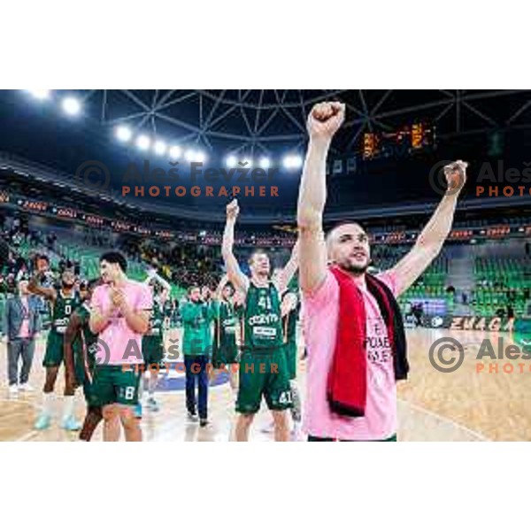 Rok Radovic and players of Cedevita Olimpija celebrate victory at BKT EuroCup 2025-2026 basketball match between Cedevita Olimpija (SLO) and Aris Thessaloniki Betsson (GRE) in SRC Stozice, Ljubljana, Slovenia on October 14, 2025
