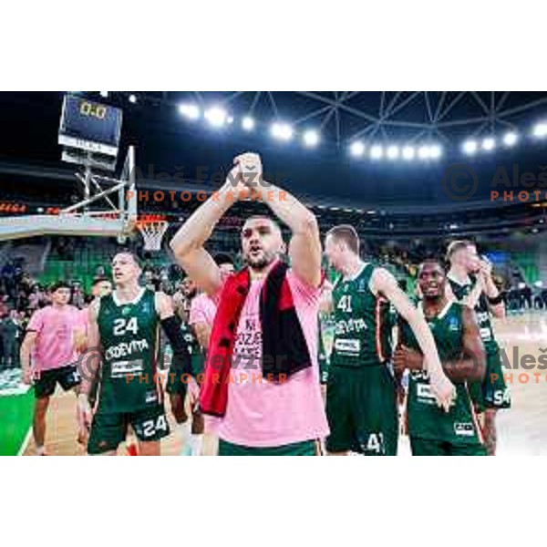Rok Radovic and players of Cedevita Olimpija celebrate victory at BKT EuroCup 2025-2026 basketball match between Cedevita Olimpija (SLO) and Aris Thessaloniki Betsson (GRE) in SRC Stozice, Ljubljana, Slovenia on October 14, 2025