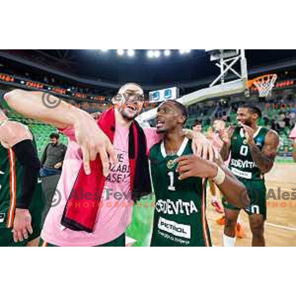 Rok Radovic and players of Cedevita Olimpija celebrate victory at BKT EuroCup 2025-2026 basketball match between Cedevita Olimpija (SLO) and Aris Thessaloniki Betsson (GRE) in SRC Stozice, Ljubljana, Slovenia on October 14, 2025