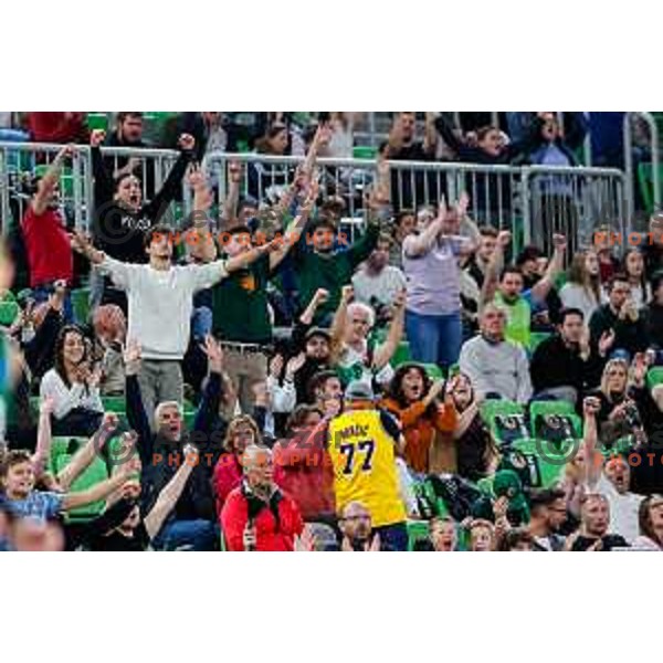Fans of Cedevita Olimpija cheering during BKT EuroCup 2025-2026 basketball match between Cedevita Olimpija (SLO) and Aris Thessaloniki Betsson (GRE) in SRC Stozice, Ljubljana, Slovenia on October 14, 2025