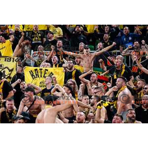 Fans of Aris cheering during BKT EuroCup 2025-2026 basketball match between Cedevita Olimpija (SLO) and Aris Thessaloniki Betsson (GRE) in SRC Stozice, Ljubljana, Slovenia on October 14, 2025