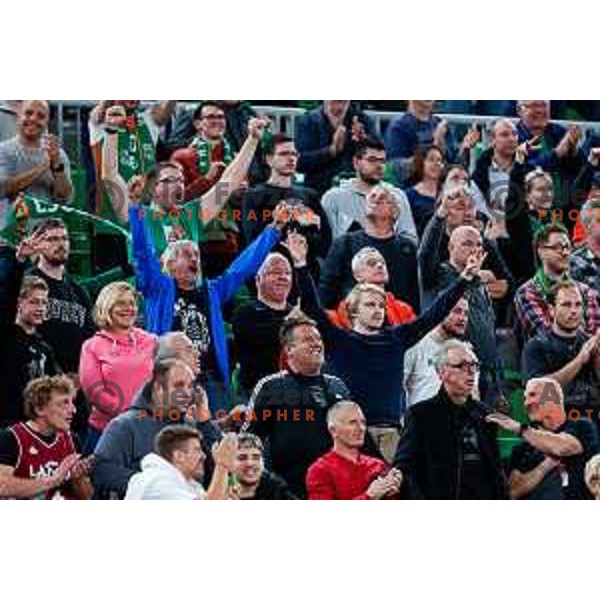 Fans of Cedevita Olimpija cheering during BKT EuroCup 2025-2026 basketball match between Cedevita Olimpija (SLO) and Aris Thessaloniki Betsson (GRE) in SRC Stozice, Ljubljana, Slovenia on October 14, 2025