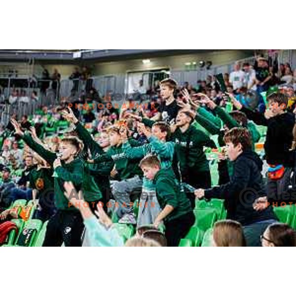 Fans of Cedevita Olimpija cheering during BKT EuroCup 2025-2026 basketball match between Cedevita Olimpija (SLO) and Aris Thessaloniki Betsson (GRE) in SRC Stozice, Ljubljana, Slovenia on October 14, 2025