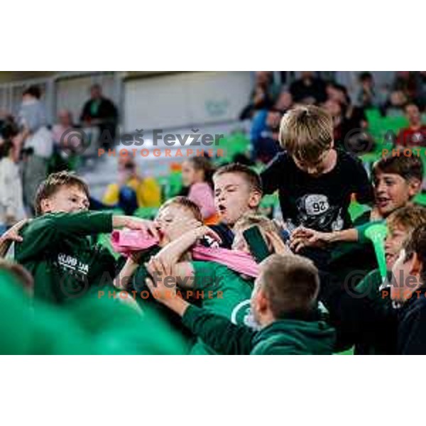 Fans of Cedevita Olimpija cheering during BKT EuroCup 2025-2026 basketball match between Cedevita Olimpija (SLO) and Aris Thessaloniki Betsson (GRE) in SRC Stozice, Ljubljana, Slovenia on October 14, 2025