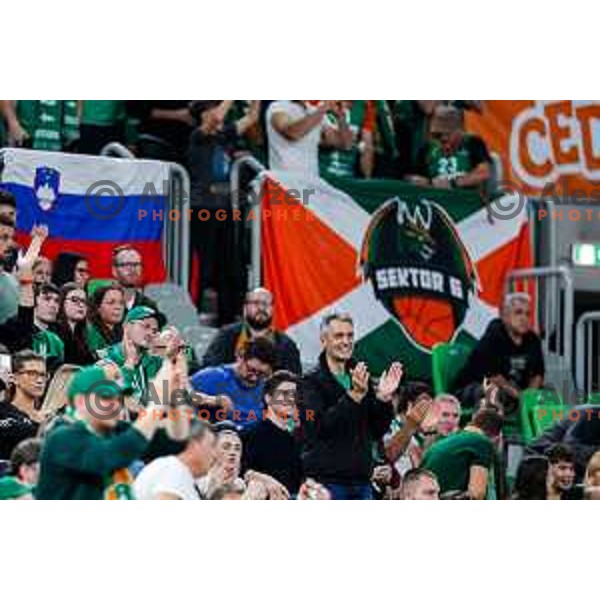 Fans of Cedevita Olimpija cheering during BKT EuroCup 2025-2026 basketball match between Cedevita Olimpija (SLO) and Aris Thessaloniki Betsson (GRE) in SRC Stozice, Ljubljana, Slovenia on October 14, 2025