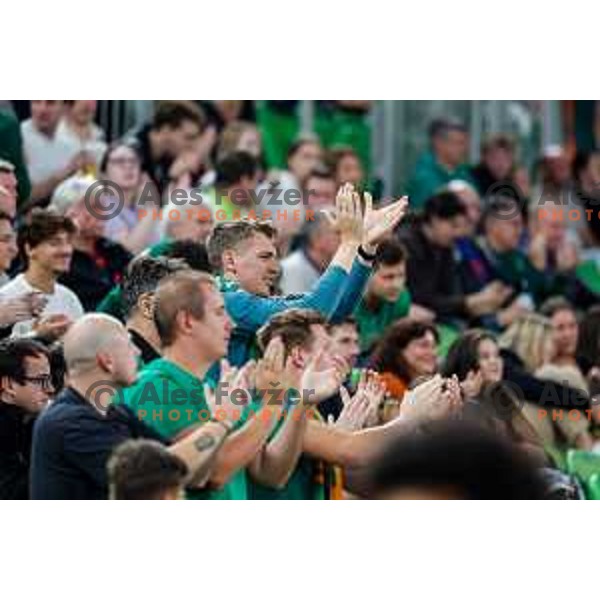 Fans of Cedevita Olimpija cheering during BKT EuroCup 2025-2026 basketball match between Cedevita Olimpija (SLO) and Aris Thessaloniki Betsson (GRE) in SRC Stozice, Ljubljana, Slovenia on October 14, 2025