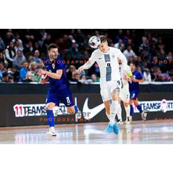 Kristian Cekol of Croatia and Jeremy Bukovec of Slovenia in action during Futsal Friendly match between Slovenia and Croatia in Dvorana Kodeljevo, Ljubljana, Slovenia on October 17, 2025. Photo: Filip Barbalic
