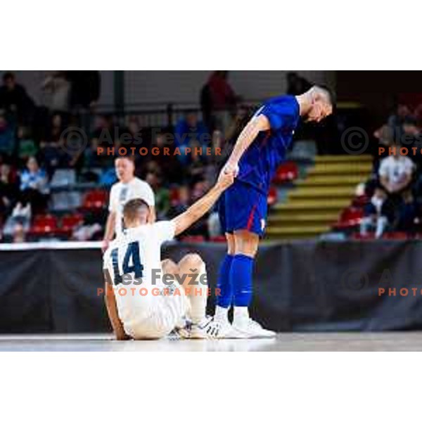 Matej Fidersek of Slovenia and Luka Peric of Croatia in action during Futsal Friendly match between Slovenia and Croatia in Dvorana Kodeljevo, Ljubljana, Slovenia on October 17, 2025. Photo: Filip Barbalic