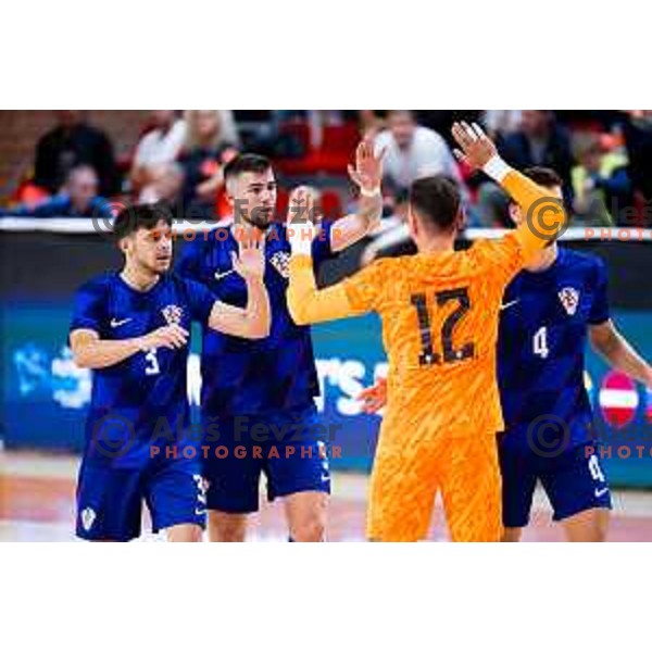 Nikola Gudasic, Luka Peric and Vinko Rozga of Croatia celebrate goal during Futsal Friendly match between Slovenia and Croatia in Dvorana Kodeljevo, Ljubljana, Slovenia on October 17, 2025. Photo: Filip Barbalic