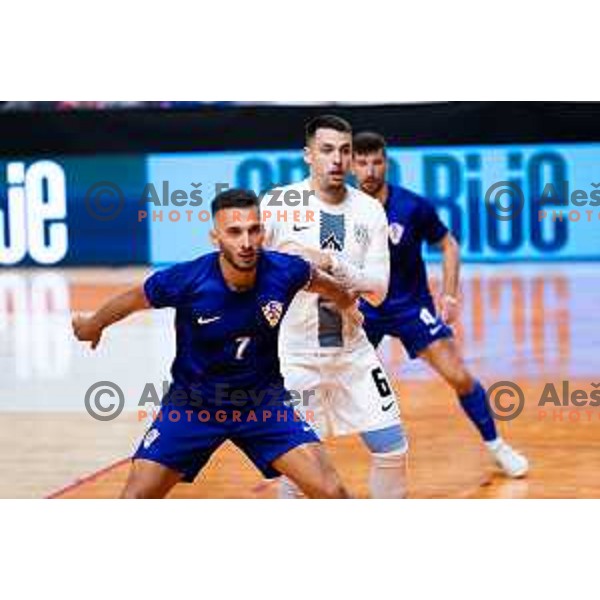 Franco Jelovcic of Croatia and Denis Knezevic of Slovenia in action during Futsal Friendly match between Slovenia and Croatia in Dvorana Kodeljevo, Ljubljana, Slovenia on October 17, 2025. Photo: Filip Barbalic