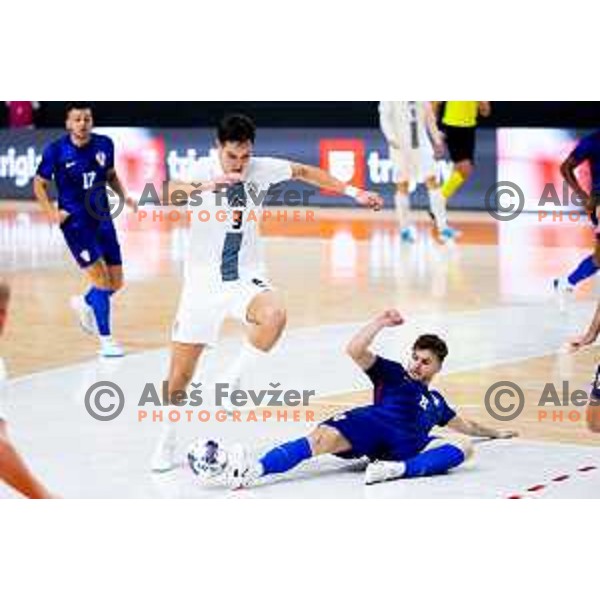 Uros Djuric of Slovenia and Kristian Cerkol of Croatia in action during Futsal Friendly match between Slovenia and Croatia in Dvorana Kodeljevo, Ljubljana, Slovenia on October 17, 2025. Photo: Filip Barbalic