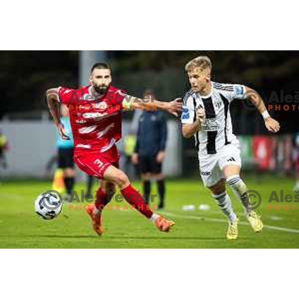 Aleksandar Zeljkovic vs Niko Kasalo in action during Prva liga Telemach 2025/26 football match between NK Aluminij and NK Mura in Sportni park Kidricevo, Slovenia on October 17, 2025. Photo: Jure Banfi