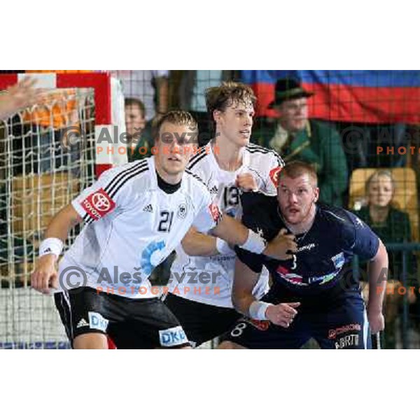 Kaufmann (21), Christophersen (13), Mlakar at handball match Slovenia- Germany in Qualification for Euro 2010, played in Arena Zlatorog, Celje, Slovenia 2.11.2008. Germany won 27:26 