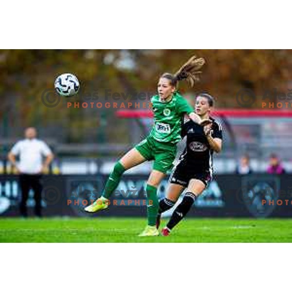 Laura Senk of ZNK Olimpija and Ziva Rakovec of ZNK Mura Nona in action during Triglav Women\'s Football League match between ZNK Olimpija and ZNK Mura Nona in Kodeljevo, Ljubljana, Slovenia on October 31, 2025. Photo: Filip Barbalic