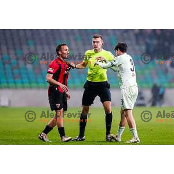 Tilen Klemencic, referee Denis Halilovic and Agustin Doffo in action during Prva liga Telemach 2025/2026 football match between Olimpija and Primorje in SRC Stozice, Ljubljana, Slovenia on Novermber 7, 2025