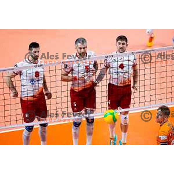 Petar Premovic, Razvan Florentin Mihalcea and Mircea Paul Peta of Dinamo Bucuresti in action during CEV Men\'s Champions League 2026 Early Stage volleyball match between ACH Volley (SLO) and Dinamo Bucuresti (ROM) in Tivoli Hall, Ljubljana, Slovenia on November 13, 2025. Photo: Filip Barbalic