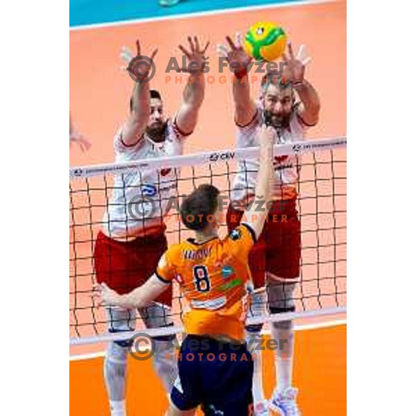 Petar Premovic of Dinamo Bucuresti, Razvan Florentin Mihalcea of Dinamo Bucuresti and Luka Marovt of ACH Volley in action during CEV Men\'s Champions League 2026 Early Stage volleyball match between ACH Volley (SLO) and Dinamo Bucuresti (ROM) in Tivoli Hall, Ljubljana, Slovenia on November 13, 2025. Photo: Filip Barbalic
