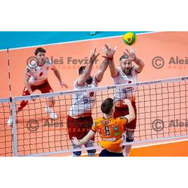 Petar Premovic of Dinamo Bucuresti, Razvan Florentin Mihalcea of Dinamo Bucuresti and Luka Marovt of ACH Volley in action during CEV Men\'s Champions League 2026 Early Stage volleyball match between ACH Volley (SLO) and Dinamo Bucuresti (ROM) in Tivoli Hall, Ljubljana, Slovenia on November 13, 2025. Photo: Filip Barbalic