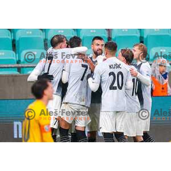 Enej Klampfer, Ognjen Gnjatic and players of Kalcer Radomlje celebrate a goal during Prva liga Telemach 2025/2026 football match between Bravo Big Bang and Kalcer Radomlje in Ljubljana, Slovenia on November 24, 2025