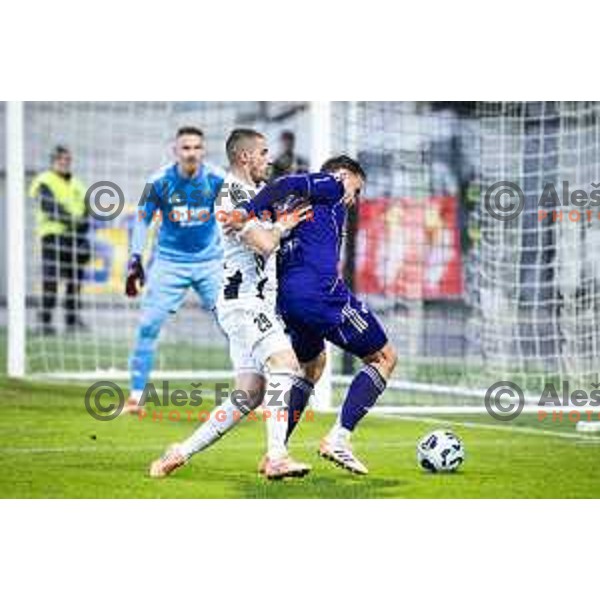 Dario Vizinger vs Pijus Sirvys in action during Prva liga Telemach 2025/26 football match between NK Mura and NK Maribor in Fazanerija, Murska Sobota, Slovenia on November 29, 2025. Photo: Jure Banfi