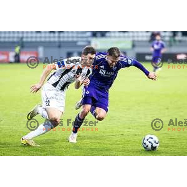 Nejc Ajhmajer vs Pijus Sirvys in action during Prva liga Telemach 2025/26 football match between NK Mura and NK Maribor in Fazanerija, Murska Sobota, Slovenia on November 29, 2025. Photo: Jure Banfi