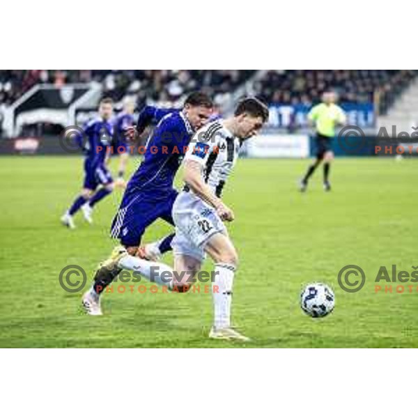 Nejc Ajhmajer vs Pijus Sirvys in action during Prva liga Telemach 2025/26 football match between NK Mura and NK Maribor in Fazanerija, Murska Sobota, Slovenia on November 29, 2025. Photo: Jure Banfi