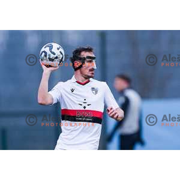 in action during Pivovarna Union Slovenian Cup quarter-final football match between Kalcer Radomlje and Primorje in Radomlje Sports Park, Slovenia on December 3, 2025