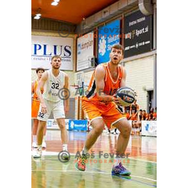 Lovro Lapajne in action during OTP Bank League basketball match between Triglav and Kansai Helios in Planina Hall, Kranj, Slovenia on December 6, 2025