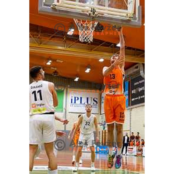 Lovro Lapajne in action during OTP Bank League basketball match between Triglav and Kansai Helios in Planina Hall, Kranj, Slovenia on December 6, 2025