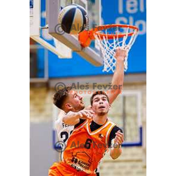 in action during OTP Bank League basketball match between Triglav and Kansai Helios in Planina Hall, Kranj, Slovenia on December 6, 2025