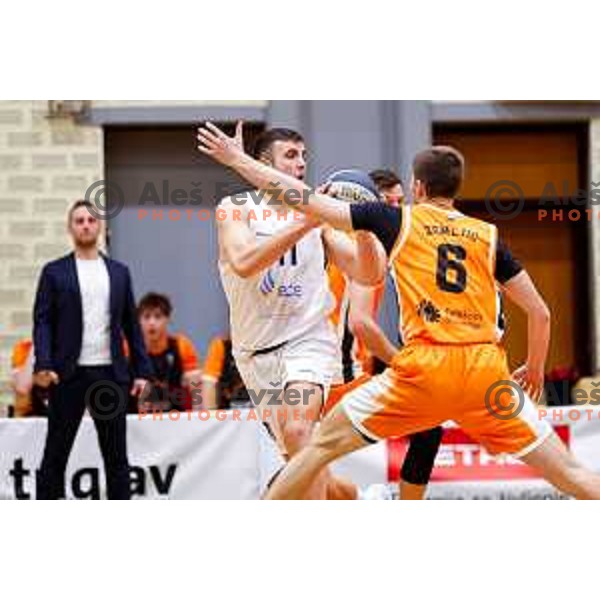 in action during OTP Bank League basketball match between Triglav and Kansai Helios in Planina Hall, Kranj, Slovenia on December 6, 2025