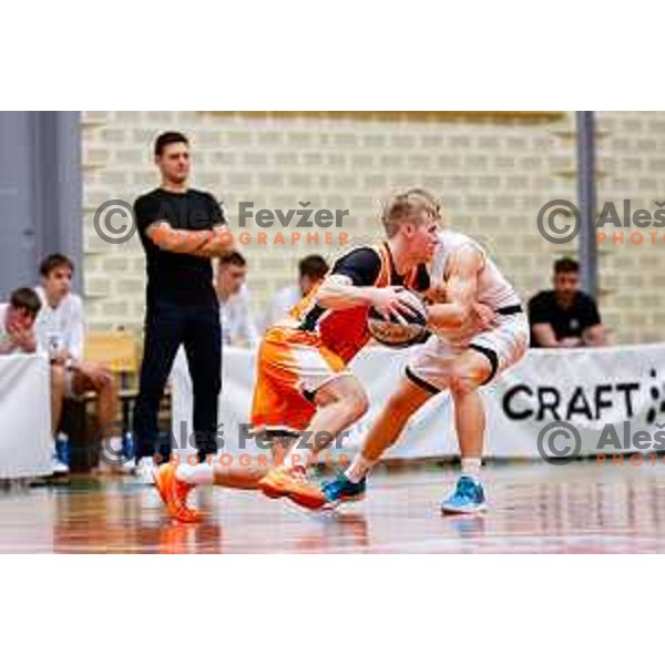 in action during OTP Bank League basketball match between Triglav and Kansai Helios in Planina Hall, Kranj, Slovenia on December 6, 2025