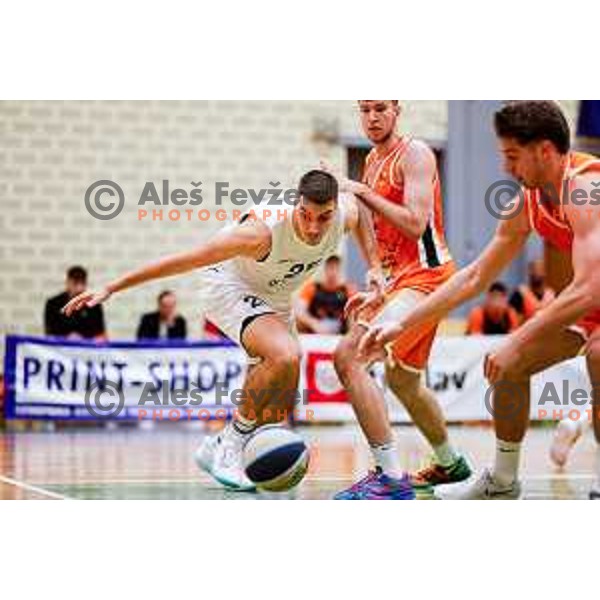 in action during OTP Bank League basketball match between Triglav and Kansai Helios in Planina Hall, Kranj, Slovenia on December 6, 2025