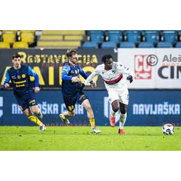 Rudi Vancas Pozeg vs Ishaq Rafiu in action during Prva liga Telemach 2025/26 football match between NK Celje and NK Primorje in Stadion z’dezele, Celje, Slovenia on December 7, 2025. Photo: Jure Banfi