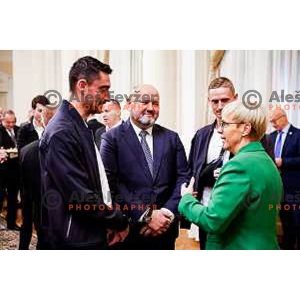 Albert Riera, Valeriy Kolotilo, Natasa Pirc Musar and Zan Karnicnik during Reception for Best Slovenian Sportswoman and Sportsman held by President of Slovenia in Ljubljana, Slovenia on December 9, 2025 